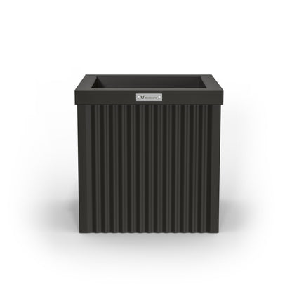 A small cube shaped planter pot in black made by Modscene. Australian pots.