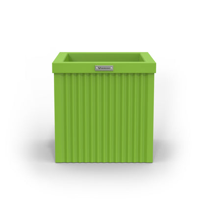 A small cube shaped planter pot in green made by Modscene. Australian pots.