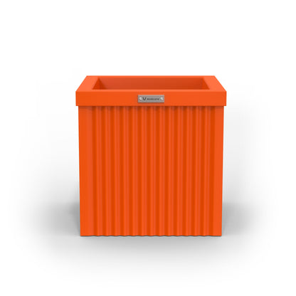 A square Modscene planter pot in orange.